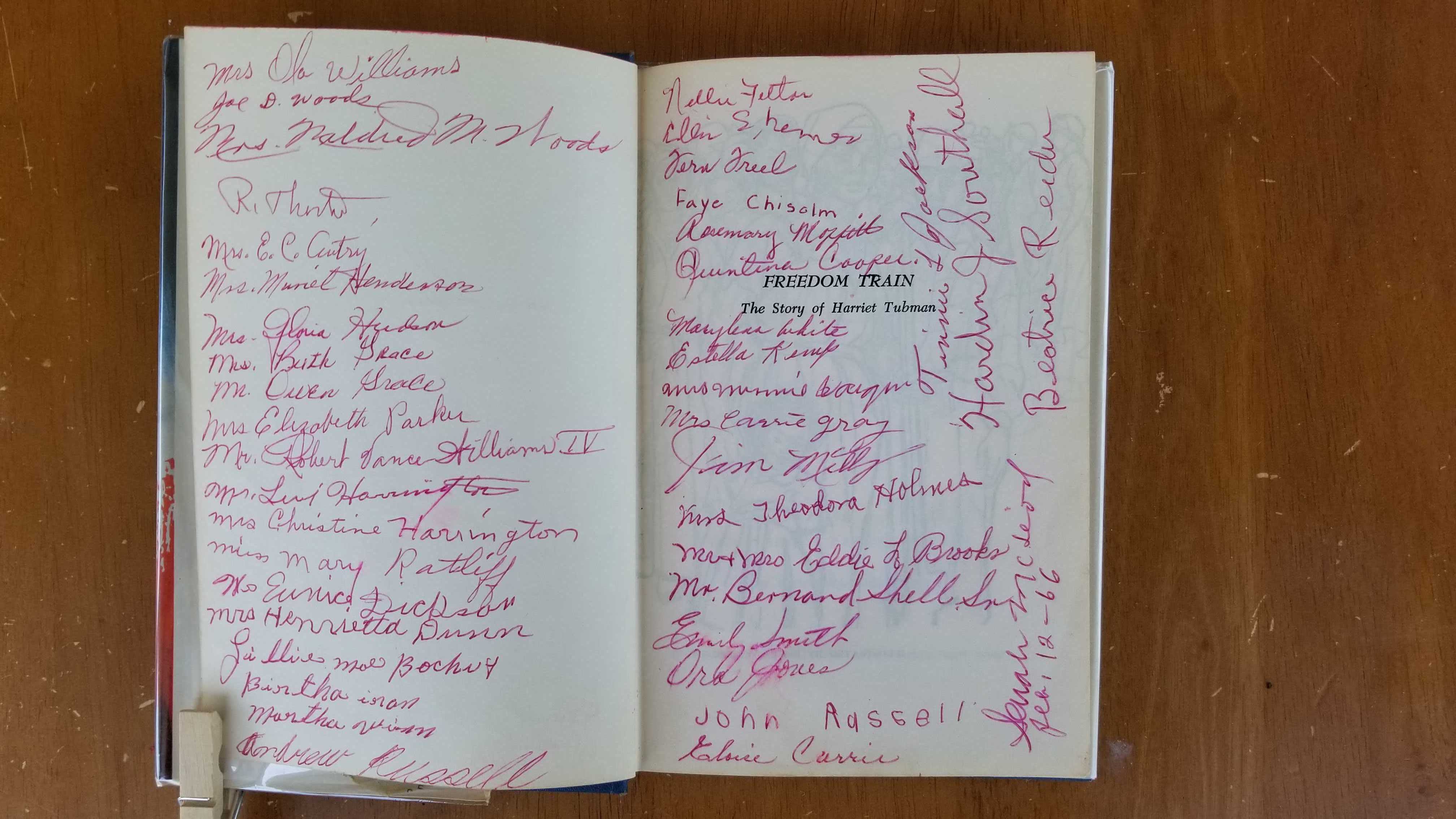 The inside cover of Dorothy Sterling’s Freedom Train holds more than 40 signatures.